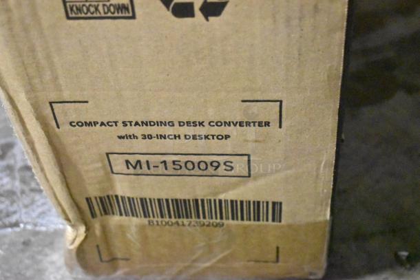 IN ORIGINAL BOX! Mount-it! Compact Standing Desk Converter with 30" desktop, model MI-15009S. Box showing barcode and label.