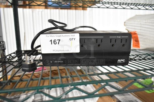 APC Back-UPS 425 Uninterruptible Power Supply, features multiple outlets, surge protection, in good condition, model visible.