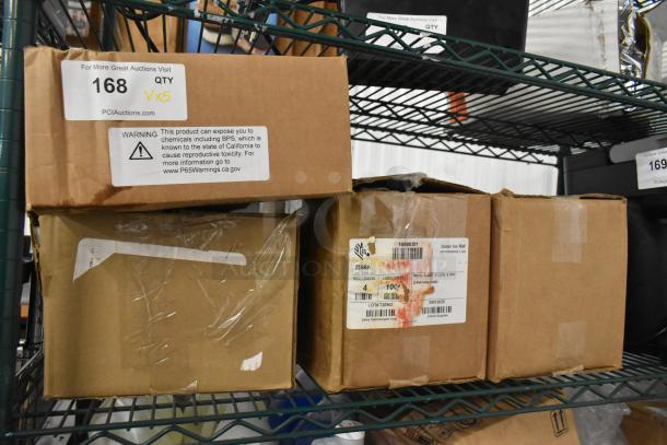 Boxes of various items including Zzebra 10010036 labels, MJ-2-7x9 PNSM20012, on storage shelf, labeled warnings visible.