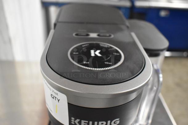Keurig K91 single serve coffee maker, 120V, 1 Phase, with control dial visible, minor surface wear, label indicating quantity.