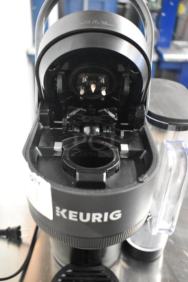 Keurig K91 Single Serve Coffee Maker, 120V, 1 Phase, open lid, visible components, black exterior.