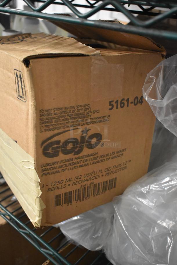 Box of GoJo Luxury Foam Handwash, 1250 mL refills for FMX-12, part of a mixed tier lot of cleaning supplies.