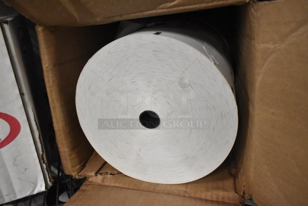 Large roll of white paper in a cardboard box, part of an ALL ONE MONEY! auction tier lot.