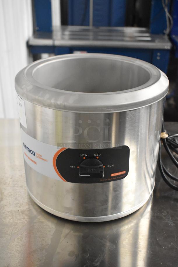 Brand new Nemco 6100A 7 Qt. Countertop Warmer, 120V, 1 Phase, minor scratches, visible controls for low to high heat.