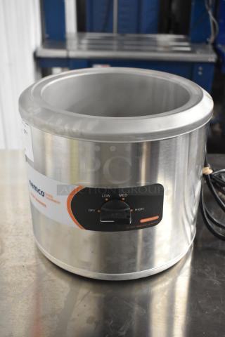 Brand new Nemco 6100A 7 Qt. Countertop Warmer, 120V, 1 Phase, minor scratches, visible controls for low to high heat.