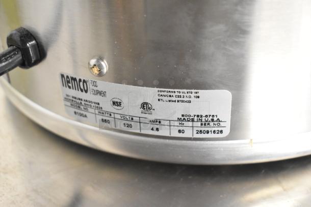 Brand new Nemco 6100A 7 Qt. countertop warmer with minor scratches, 120 volts, model label visible, made in USA.