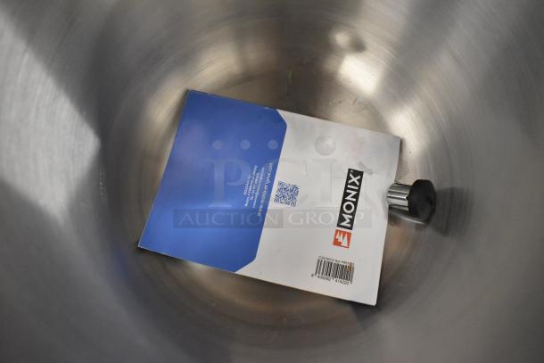 Monix Classica Pressure Steamer Pot interior with label showing brand name, barcode, and website. New condition.