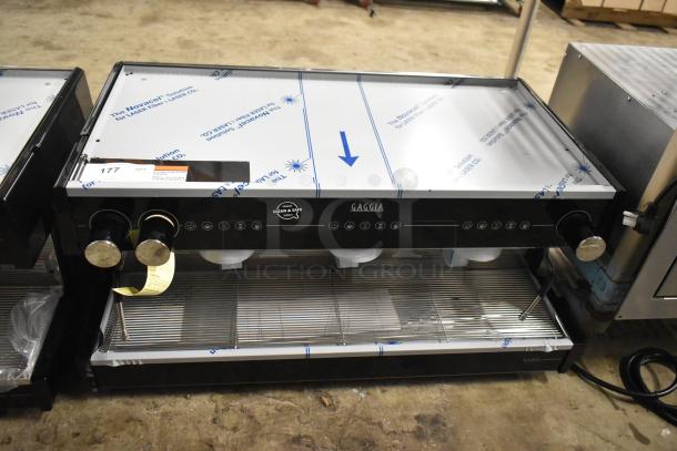 BRAND NEW SCRATCH AND DENT Gaggia MGV293NPU Vetro Black 3 Group Automatic Espresso Machine, 220/230 Volts, visible protective film.