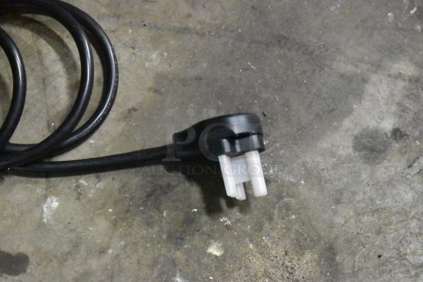 Black power cord with a three-pronged plug for the Gaggia MGV293NPU Vetro Black 3 Group Automatic Espresso Machine.