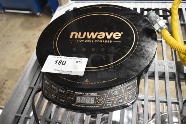 Brand new, scratch and dent Nuwave 30211 induction range, 120V. Black, digital controls, countertop single burner.
