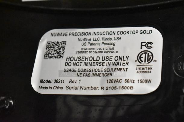 BRAND NEW Nuwave 30211 Countertop Single Burner Induction Range label showing model, voltage, and use warnings.