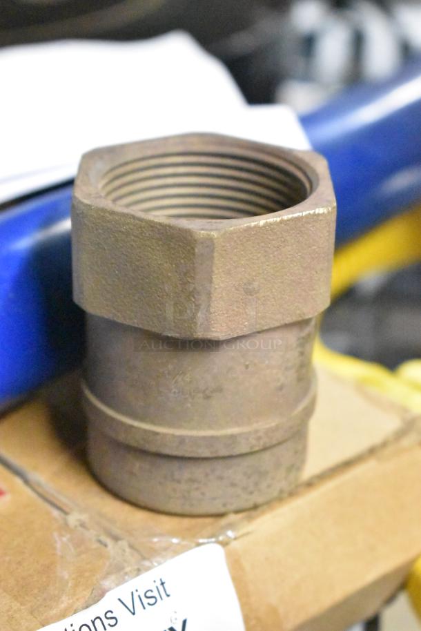 Sioux Chief 646-CG5 1-1/4" CPVC x MIP brass straight adapter, new, slight cosmetic wear from storage, visible threading detail.