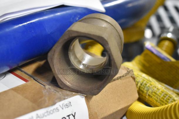 6 new mixed items including Robot Coupe E8 S5/16 blade, Sioux Chief 870-6 cover, gas hose, adaptor, showing packaging.