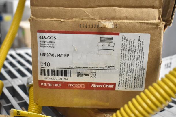 Cardboard box with Sioux Chief 646-CG5 adapter label, 1-1/4" CPVC x 1-1/4" MIP, made in Thailand, 10 units.