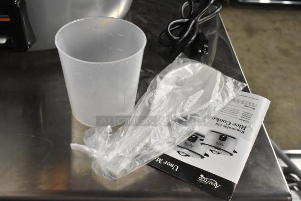 BRAND NEW Avantco 177RCB60 rice cooker accessories; includes measuring cup and spoon in packaging, manual visible.