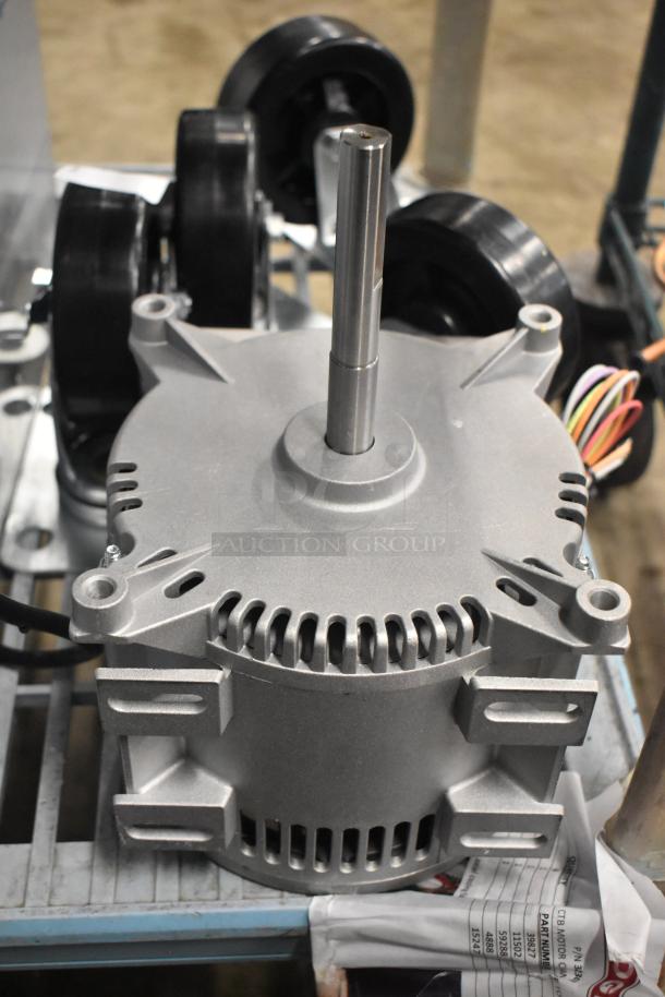 Brand new Nidec motor, 208-240V, 1 phase, with visible scratches and dents.