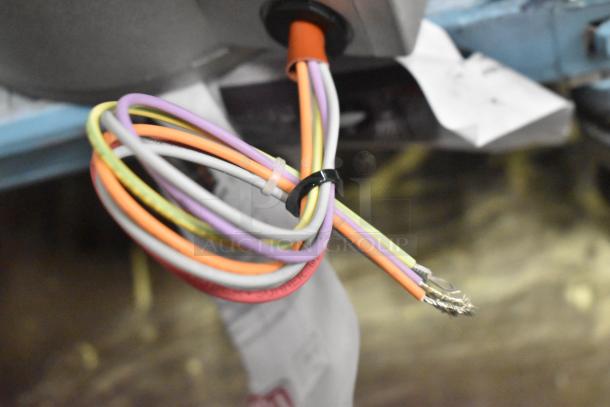 BRAND NEW Nidec Motor, 208-240V, 1 Phase, with colorful wiring. Scratch and dent condition.