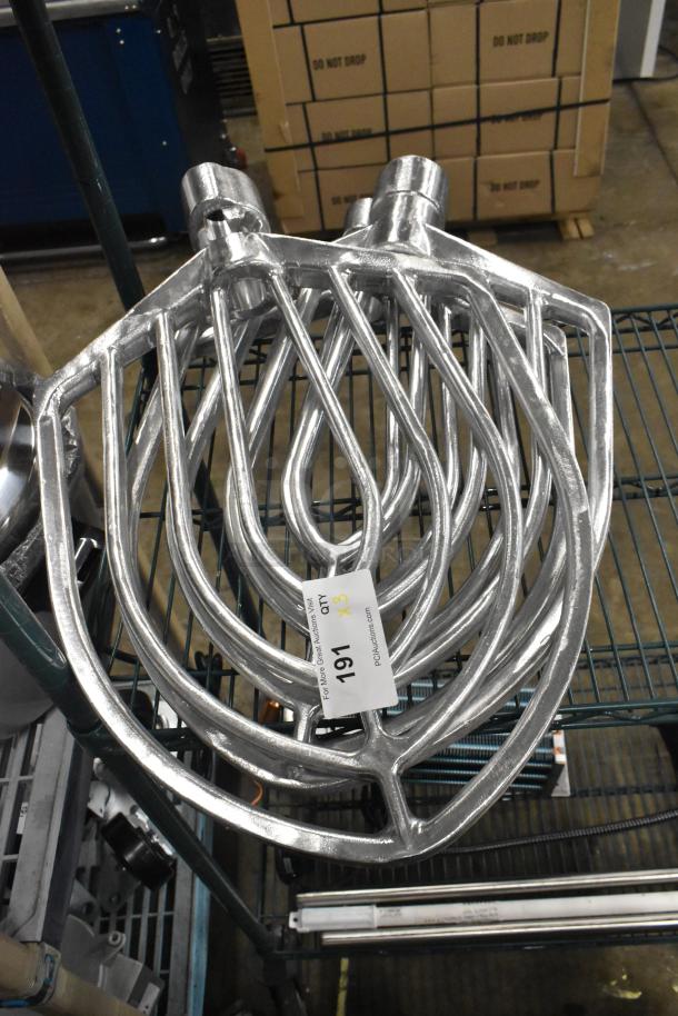 Three new aluminum flat beaters for 60 Qt. mixer bowls, with minor scratches. Tag reads "191, Qty x3, PCIauctions.com."