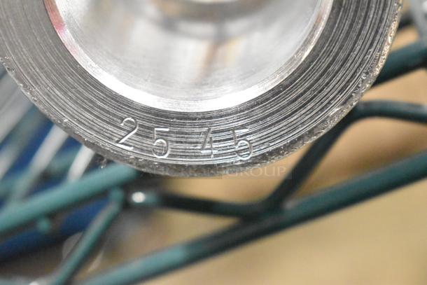 Close-up of stainless steel component with engraved numbers "2545" visible. Part of scratch and dent auction items.