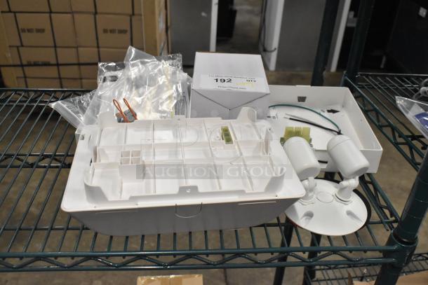 Brand new Dual-Lite EVHC6IDP LED emergency wall light with Hubbell EVSCEZP enclosure, minor scratches; commercial use.