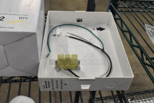 Commercial LED emergency wall light in box. Includes Dual-Lite EVHC6IDP light, Hubbell EVSCEZP enclosure. New, slight wear.