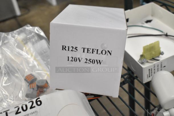 BRAND NEW SCRATCH AND DENT set with Dual-Lite EVHC6IDP LED emergency wall light and Hubbell EVSCEZP enclosure. Box marked "R125 TEFLON 120V 250W".