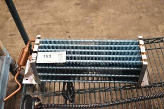 BRAND NEW 6R5K370LAA Evaporator Coil, scratch and dent condition, visible copper tubing and metal fins, tag marked 193.