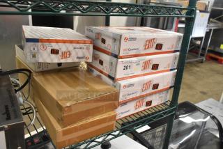 11 new scratch and dent items; includes Lithonia Lighting LED Quantum exit signs and DualLite EVHCEZP LED emergency light.