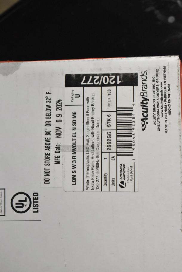 Box with labels for Lithonia Lighting LED Exit Sign, showing specs: white thermoplastic, red letters, NiCad battery backup.
