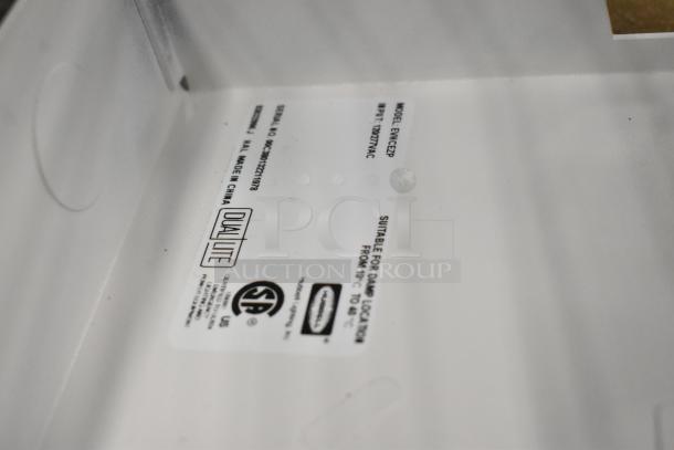 11 new scratch and dent items, including DualLite EVHCEZP LED emergency light. Label shows model and suitability details.