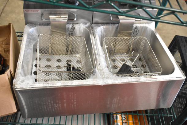 Mainstreet 177F20E electric fryer with dual tanks, 20 lb. capacity, includes 2 lids and baskets. New condition, 110V, 1 phase.