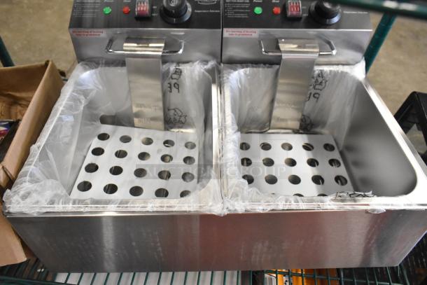 Mainstreet 177F20E dual tank electric fryer, 20 lb., with two lids and baskets. Stainless steel, 110V, 1 phase. New condition.