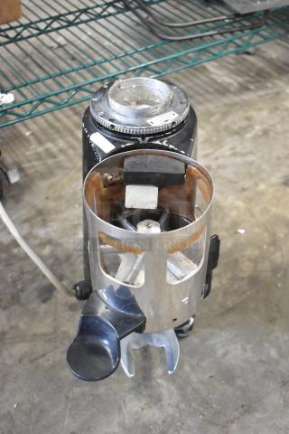 Magister M MD LA espresso grinder base, no hopper, 115V, 1 phase. Stainless body, commercial countertop model, used condition.