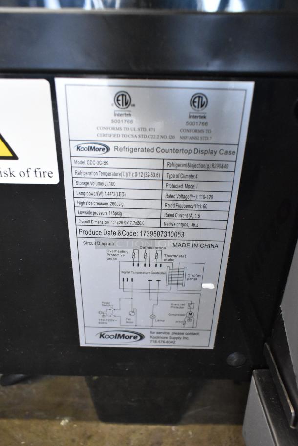 BRAND NEW KoolMore CDC-3C-BK Countertop Display Refrigerator, 3.6 Cu Ft, 115V, 1 Phase. Label shows model, specs, and circuit diagram.