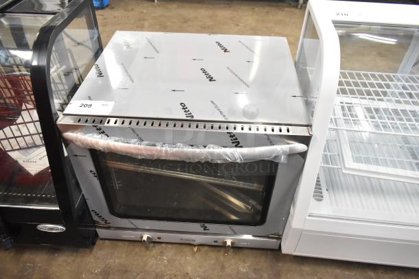 Brand new KoolMore KM-CTCO220-23 countertop convection oven, 2.3 cu. ft., 2800W, 4 racks, with scratch and dent packaging.