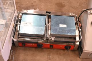 Brand new Avantco 177PG400GS dual panini grill; grooved top, smooth bottom, 19 5/8" x 9 1/8" surface, 120V, minor scratches.