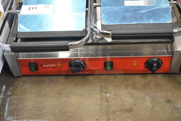 Brand new Avantco 177PG400GS dual panini grill, grooved top, smooth bottom, 19 5/8" x 9 1/8", 120V, scratch and dent condition.