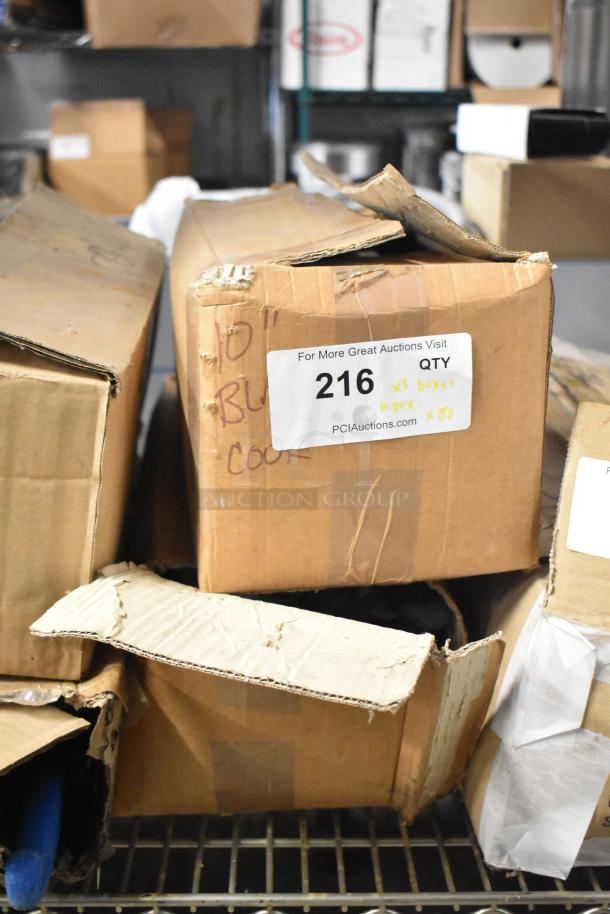 Box containing 80 sharpened stainless steel knives including a chef knife. Visible label: "For More Great Auctions Visit 216 QTY".