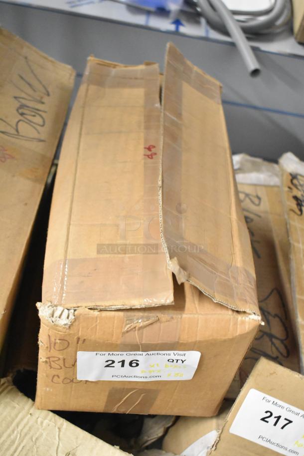 Boxed set of 80 sharpened stainless steel knives, includes Chef knife. Visible label: "216 QTY." Box shows some wear.