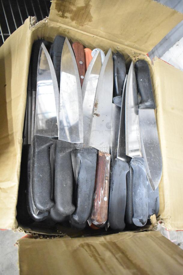 Box of 180 sharpened stainless steel knives, including chef, filet, and poultry knives, various handles, used condition.
