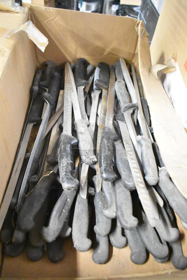 Box of 120 sharpened stainless steel knives, including filet knives. Black handles, used condition.
