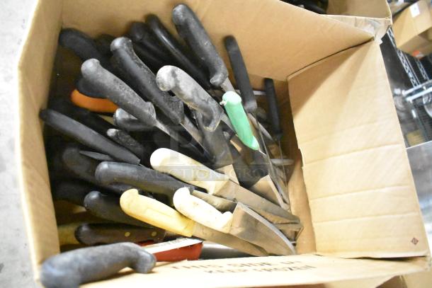 Box of 120 sharpened stainless steel knives with mixed handles, including filet knife, in excellent condition.