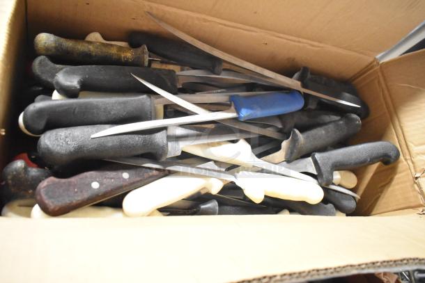 Box of 200 sharpened stainless steel knives including filet, serrated, and rocking cutter, featuring various handles.