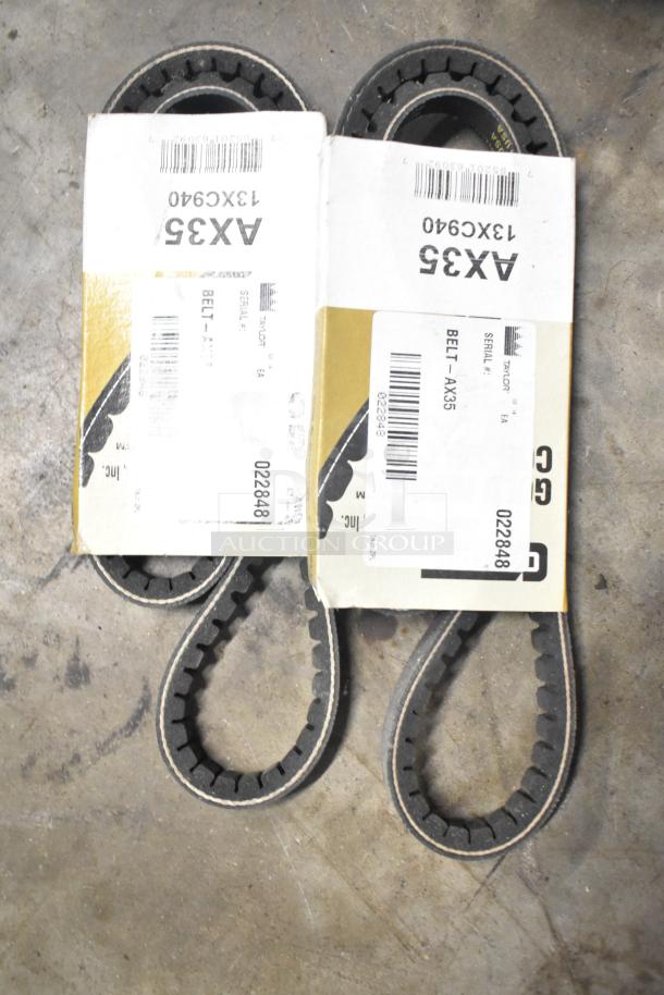Two AX35 belts in packaging with barcodes and labels. Part number 13XC940 visible. Auction item includes various lot items.