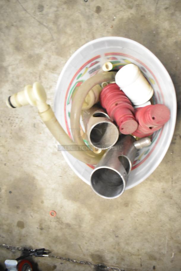 Tier lot of various parts, including Flavor Burst components and Turbochef kickplate, in a plastic bin.