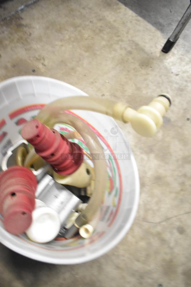 Assorted item lot in a bucket, includes Flavor Burst parts, drop-in bin, Turbochef kickplate, and ballasts. Good condition.