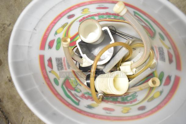 Assorted Flavor Burst parts in a bucket; visible hoses, connectors, and metal components, fair condition.