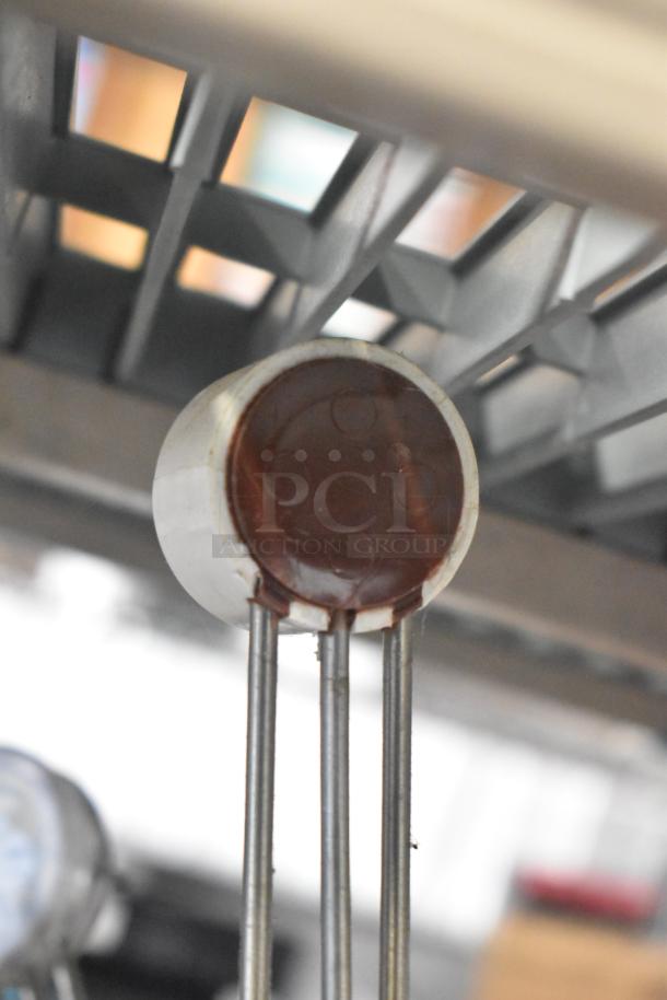 Alt text: Close-up of metallic Flavor Burst part, featured in a mixed lot with drop-in bin, Turbochef kickplate, ballasts.