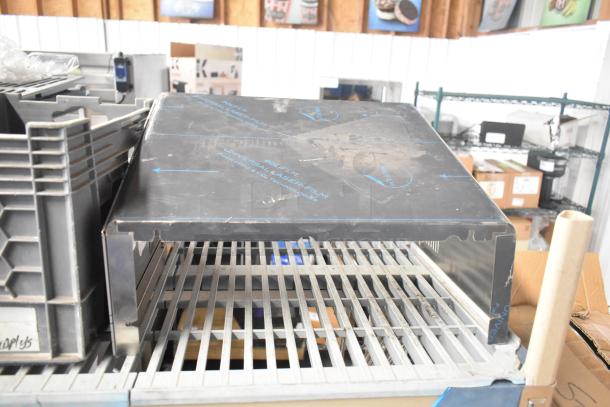 ALL ONE MONEY! Tier lot featuring a variety of items including a mixing cup collar and fluorescent sockets. Visible wear on surfaces.