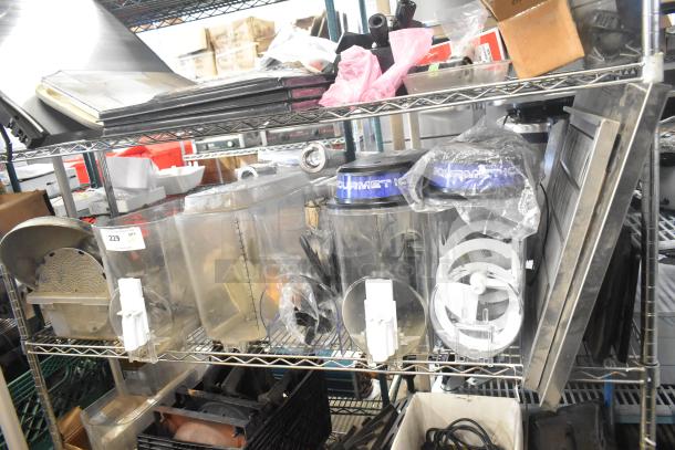 Tier lot featuring slushie machine hoppers, metal panels, meat grinder tray, and Pelican head grating blade on metal shelves.